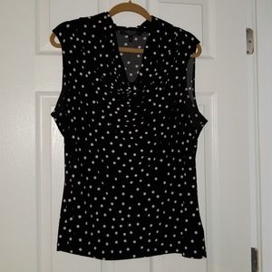 Womens sleeveless black top with white polka-dots